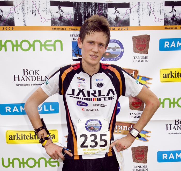 Olle Bosström framför backdrop